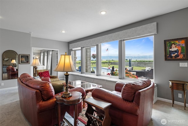 1702 Jb George Rd, Walla Walla, WA 99362 - living area with light colored carpet, baseboards, and recessed lighting
