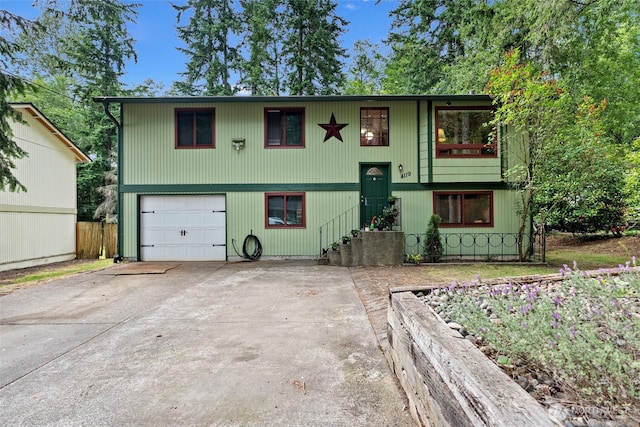 4119 Big Beef Xing NW, Bremerton, WA 98312 - split foyer home with an attached garage and concrete driveway