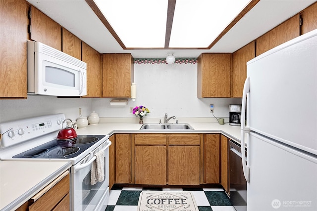 4119 Big Beef Xing NW, Bremerton, WA 98312 - kitchen featuring white appliances, light flooring, brown cabinets, and light countertops