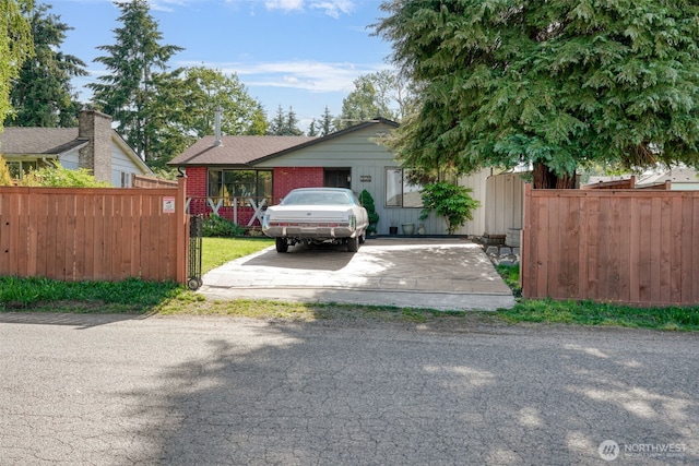 6965E E E, Tacoma, WA 98404 - view of front of house featuring brick siding