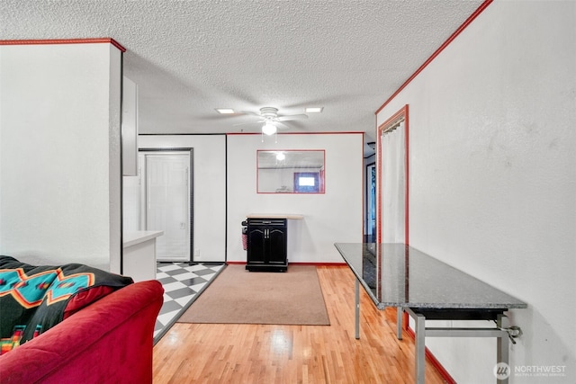 6965E E E, Tacoma, WA 98404 - living room with a textured ceiling, wood finished floors, and a ceiling fan