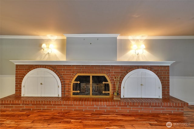 26025 Tronson Rd, Arlington, WA 98223 - unfurnished living room featuring ornamental molding and wood finished floors