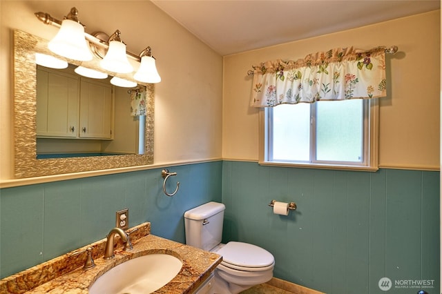 26025 Tronson Rd, Arlington, WA 98223 - half bathroom with toilet, vanity, and wainscoting