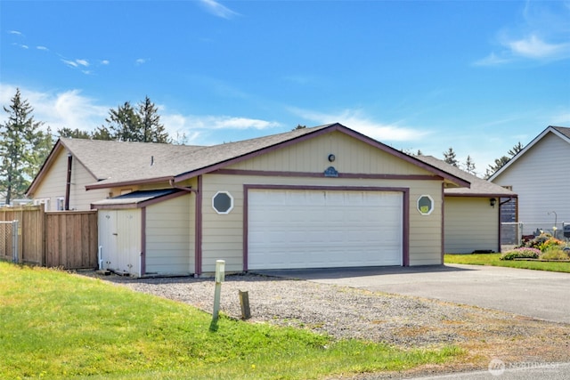 546 Canal Dr NE, Ocean Shores, WA 98569 - single story home featuring asphalt driveway and an attached garage