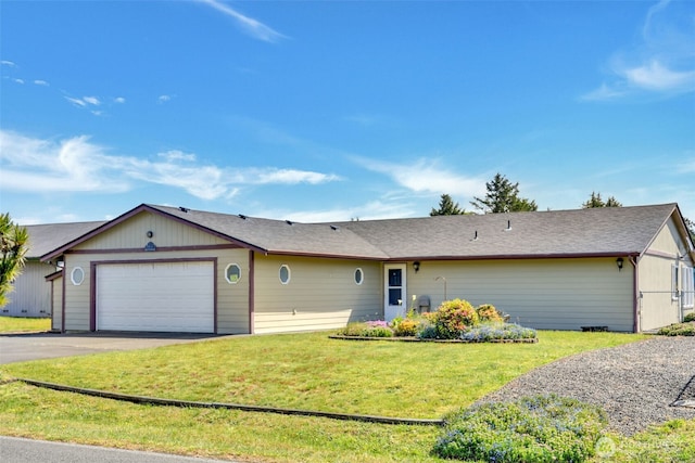 546 Canal Dr NE, Ocean Shores, WA 98569 - single story home featuring a garage and asphalt driveway