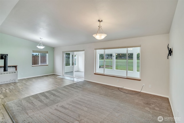 546 Canal Dr NE, Ocean Shores, WA 98569 - unfurnished living room featuring baseboards and wood finished floors