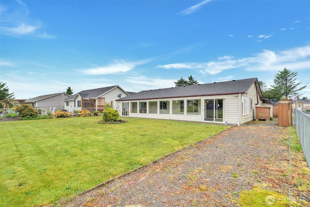 546 Canal Dr NE, Ocean Shores, WA 98569 - back of house with driveway and a garage