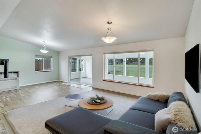 546 Canal Dr NE, Ocean Shores, WA 98569 - living room with wood finished floors and vaulted ceiling