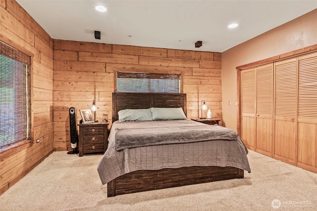 130 N Hendrickson Rd, Vader, WA 98593 - carpeted bedroom with wooden walls, a closet, and recessed lighting