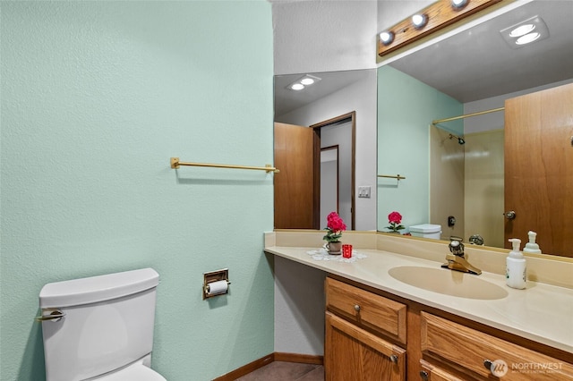 17440 NE 38th St Unit A302, Redmond, WA 98052 - bathroom featuring toilet, vanity, and a shower