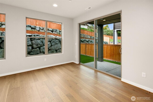 8116 131st Pl SE Unit 16, Snohomish, WA 98296 - unfurnished room featuring baseboards, wood finished floors, and recessed lighting