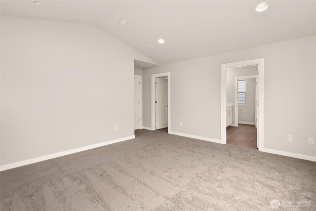 8116 131st Pl SE Unit 16, Snohomish, WA 98296 - carpeted spare room featuring lofted ceiling, recessed lighting, and baseboards