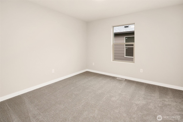 8116 131st Pl SE Unit 16, Snohomish, WA 98296 - carpeted spare room featuring baseboards