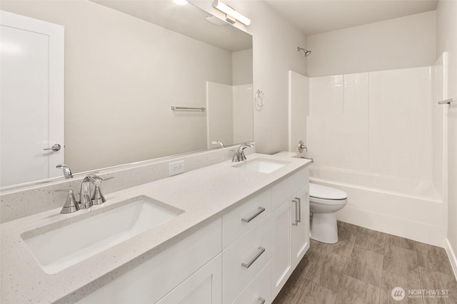 8116 131st Pl SE Unit 16, Snohomish, WA 98296 - bathroom with double vanity, bathtub / shower combination, and toilet