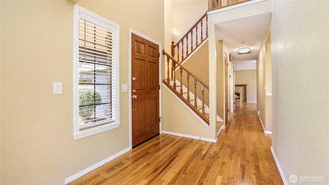 1931 237th St SE, Bothell, WA 98021 - foyer featuring light wood-style flooring and stairs