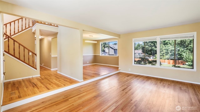 1931 237th St SE, Bothell, WA 98021 - empty room with wood finished floors and stairs