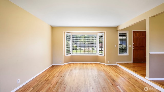 1931 237th St SE, Bothell, WA 98021 - empty room featuring light wood-style floors and baseboards
