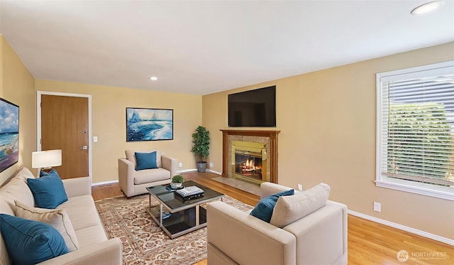 1931 237th St SE, Bothell, WA 98021 - living room featuring light wood-type flooring, a premium fireplace, and recessed lighting