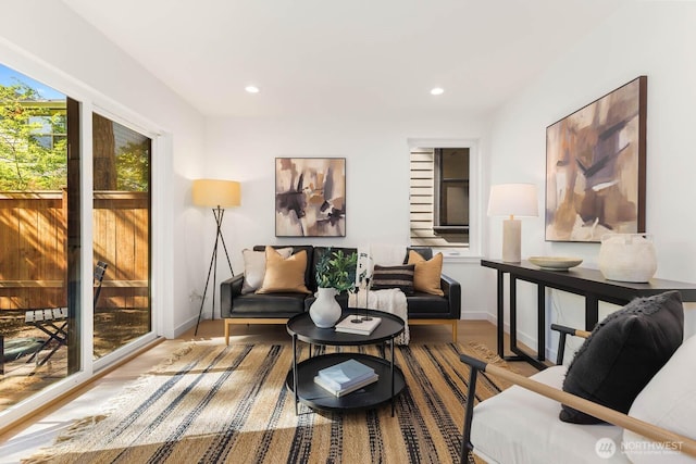 5613 43rd Ave NE, Seattle, WA 98105 - sitting room featuring baseboards, wood finished floors, and recessed lighting