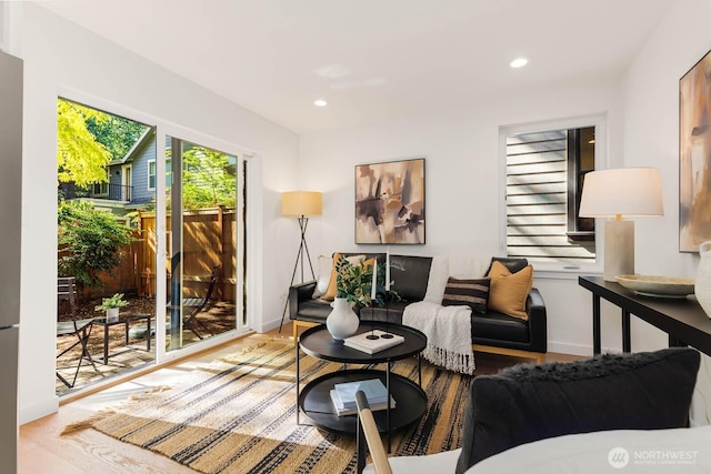 5613 43rd Ave NE, Seattle, WA 98105 - living room featuring recessed lighting, wood finished floors, and baseboards