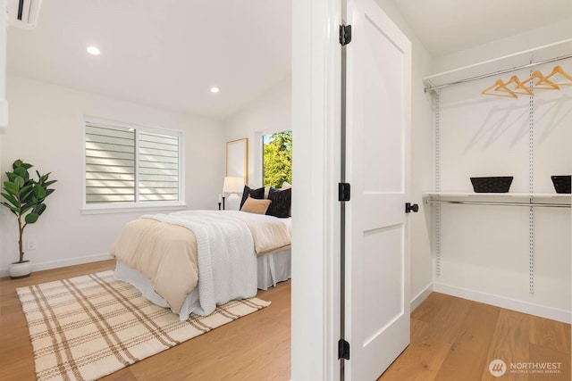5613 43rd Ave NE, Seattle, WA 98105 - bedroom featuring light wood-style flooring, recessed lighting, vaulted ceiling, and baseboards