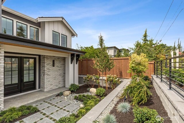 215 8th Ave W, Kirkland, WA 98033 - view of yard with french doors and a garden