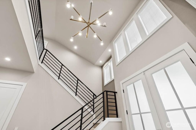215 8th Ave W, Kirkland, WA 98033 - staircase with a chandelier and a towering ceiling