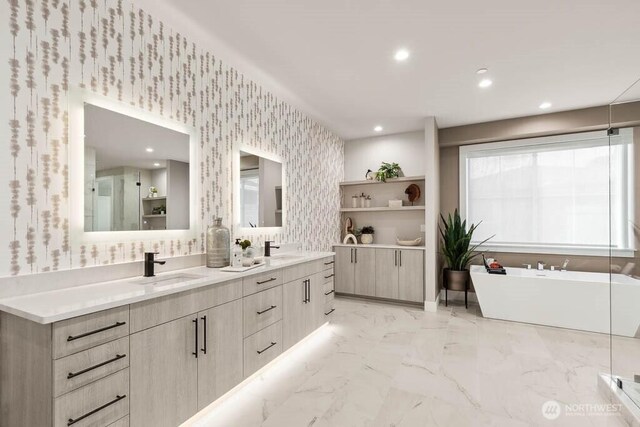 215 8th Ave W, Kirkland, WA 98033 - full bath featuring a freestanding tub, double vanity, wallpapered walls, recessed lighting, and marble finish floors