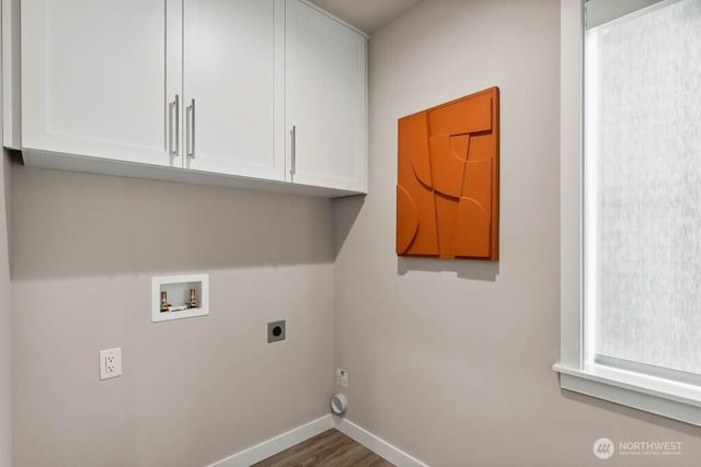 215 8th Ave W, Kirkland, WA 98033 - laundry area with hookup for an electric dryer, hookup for a washing machine, cabinet space, baseboards, and wood finished floors
