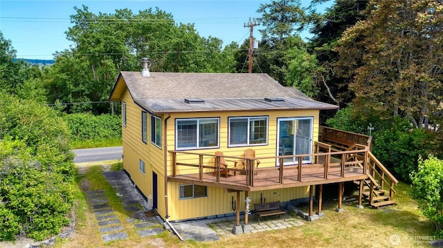 669 Marine Dr, Point Roberts, WA 98281 - rear view of property with a wooden deck, stairs, and a shingled roof