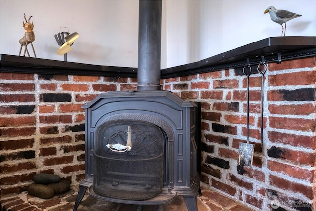 669 Marine Dr, Point Roberts, WA 98281 - detailed view of a wood stove and brick siding