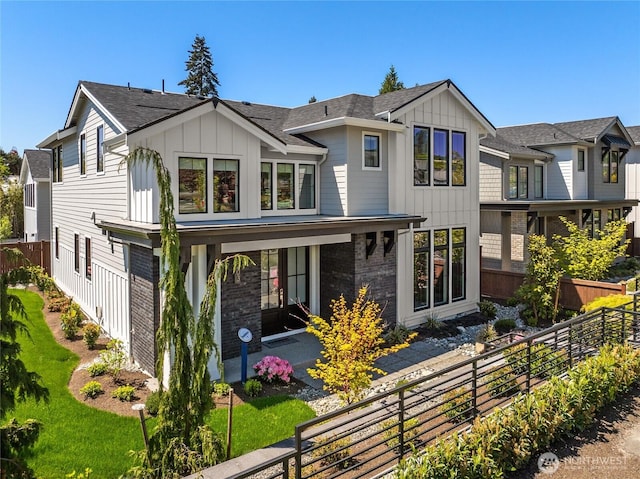 203 8th Ave W, Kirkland, WA 98033 - modern inspired farmhouse with board and batten siding, brick siding, and a fenced backyard