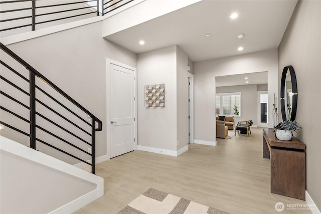 203 8th Ave W, Kirkland, WA 98033 - entrance foyer featuring recessed lighting, wood finished floors, stairs, and baseboards