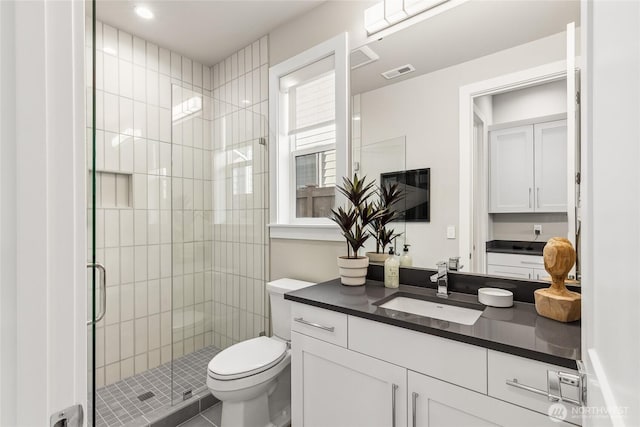 203 8th Ave W, Kirkland, WA 98033 - bathroom with vanity, a shower stall, and toilet