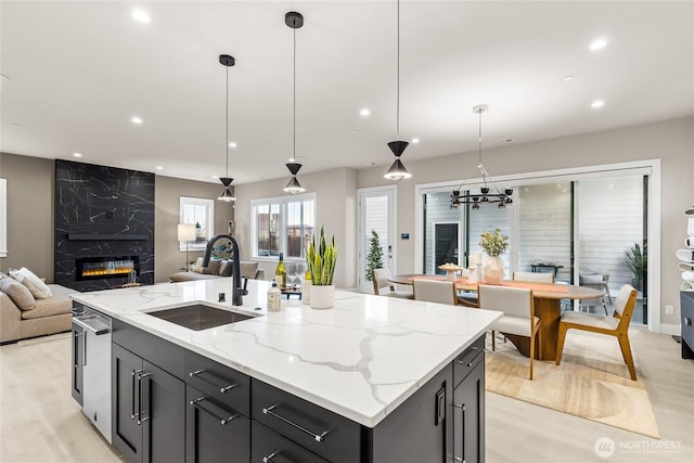 203 8th Ave W, Kirkland, WA 98033 - kitchen featuring a sink, open floor plan, light wood-style floors, dishwasher, and recessed lighting