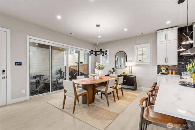 203 8th Ave W, Kirkland, WA 98033 - dining space with a chandelier, light wood-type flooring, recessed lighting, and baseboards