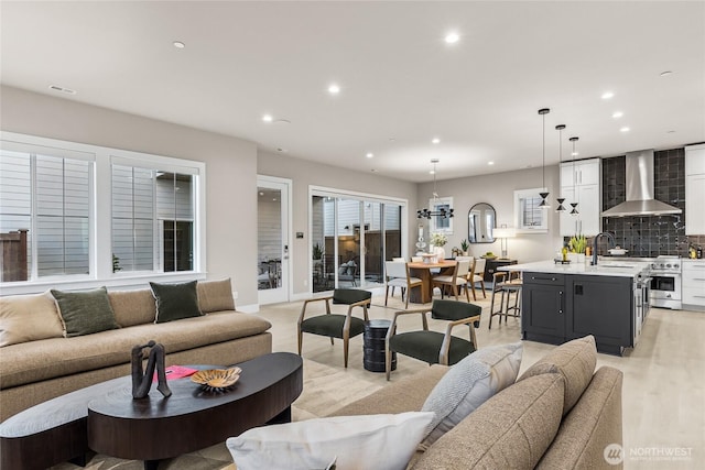 203 8th Ave W, Kirkland, WA 98033 - living area with recessed lighting, light wood finished floors, and a chandelier