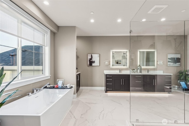 203 8th Ave W, Kirkland, WA 98033 - bathroom with a soaking tub, vanity, recessed lighting, marble finish flooring, and baseboards