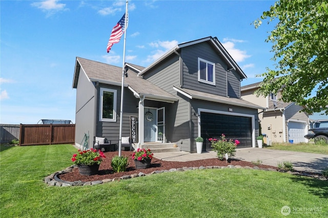 16574 Greenleaf Ave SE, Yelm, WA 98597 - view of front of home featuring a garage and concrete driveway