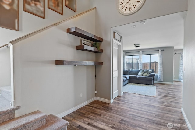 16574 Greenleaf Ave SE, Yelm, WA 98597 - staircase featuring wood finished floors and baseboards