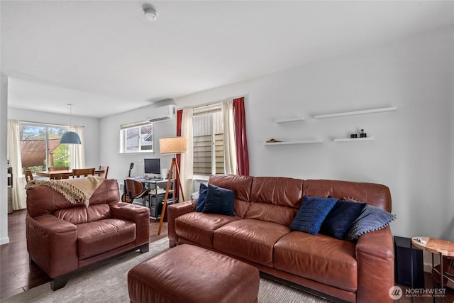 2838 SW 106th St, Seattle, WA 98146 - living room featuring a wall unit AC, wood finished floors, and an office area
