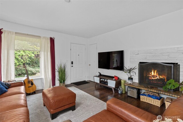 2838 SW 106th St, Seattle, WA 98146 - living room with wood finished floors and a stone fireplace