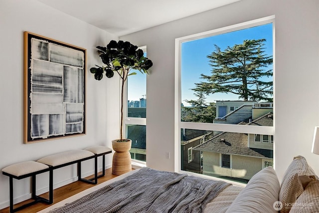 1225 E Roy St, Seattle, WA 98102 - bedroom featuring wood finished floors and baseboards