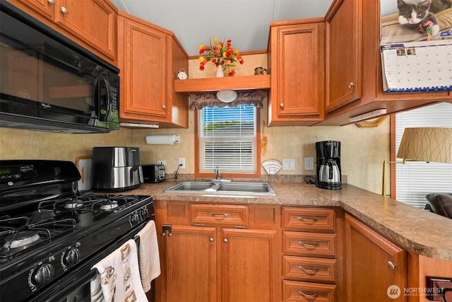 4751 Birch Bay Lynden Rd Unit 32, Blaine, WA 98230 - kitchen with black appliances, a sink, brown cabinets, and open shelves