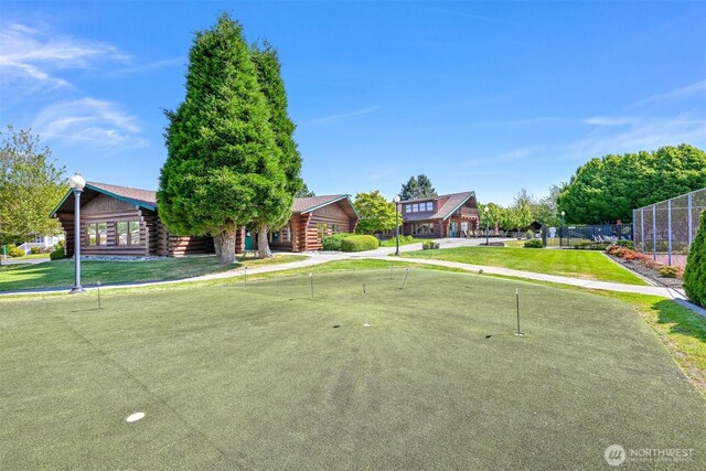 4751 Birch Bay Lynden Rd Unit 32, Blaine, WA 98230 - log-style house with log siding, a putting area, and driveway