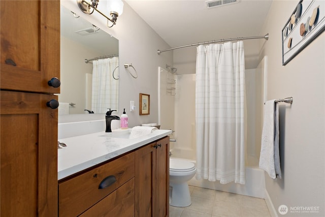 513 I St SW, Tumwater, WA 98512 - bathroom with vanity, tile patterned floors, toilet, and shower / tub combo