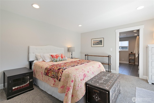 513 I St SW, Tumwater, WA 98512 - tiled bedroom with carpet, recessed lighting, and baseboards
