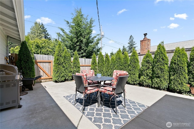 513 I St SW, Tumwater, WA 98512 - view of patio with outdoor dining space and a grill