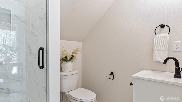 10811 Holly Dr Unit C, Everett, WA 98204 - full bathroom featuring toilet, vanity, a marble finish shower, and vaulted ceiling