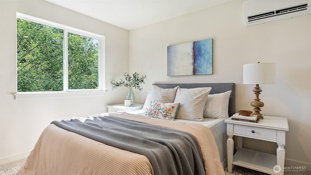 10811 Holly Dr Unit C, Everett, WA 98204 - bedroom featuring a wall unit AC and baseboards